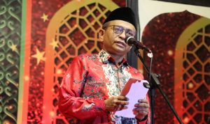 Ketua Panitia, H.M. Siddiq menyampaikan laporan panitia dalam pembukaan MTQ IX di kecamatan wotu, Rabu (9/3/22), Malam.