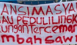 Spanduk Aliansi Masyarakat Burau Peduli Lingkungan